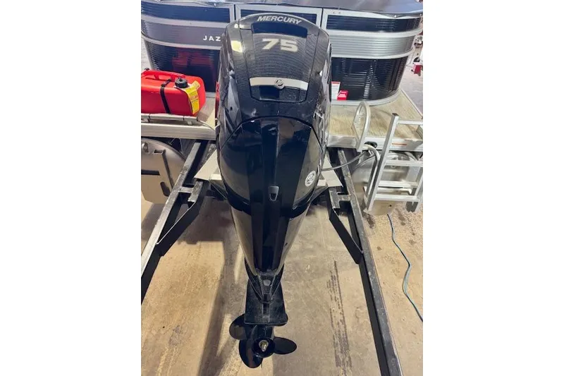 Slide: The Image of 2026 Princecraft Jazz 210-2S boat with Mercury 75 outboard motor on trailer. - 11