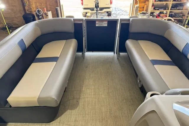 Slide: The Image of 2026 Princecraft Jazz 210-2S pontoon boat interior with spacious seating and modern design. - 5