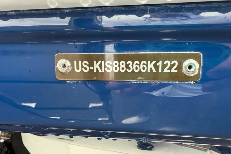 Slide: The Image of 2022 Crownline 264 CR boat with visible hull identification number plate. - 42