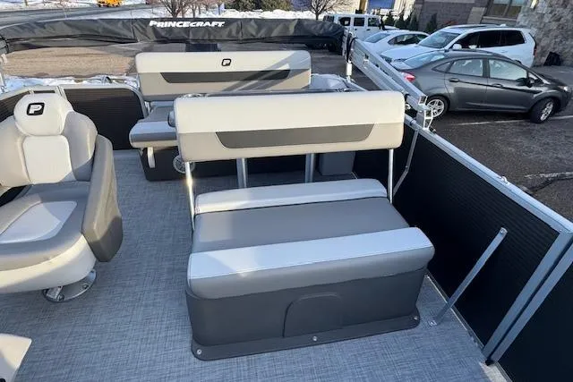 Slide: The Image of 2026 Princecraft Vectra 21 RL pontoon boat interior with gray seating and modern design. - 13