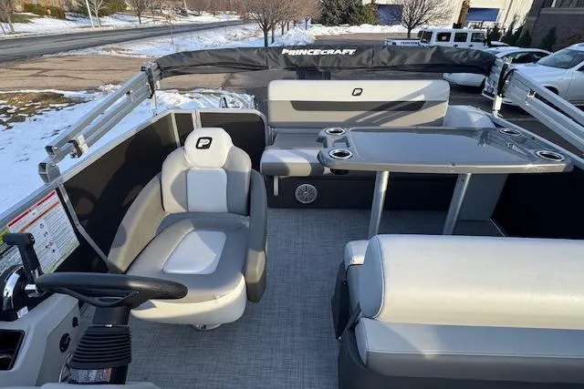 Slide: The Image of 2026 Princecraft Vectra 21 RL pontoon boat interior with seating and table. - 14