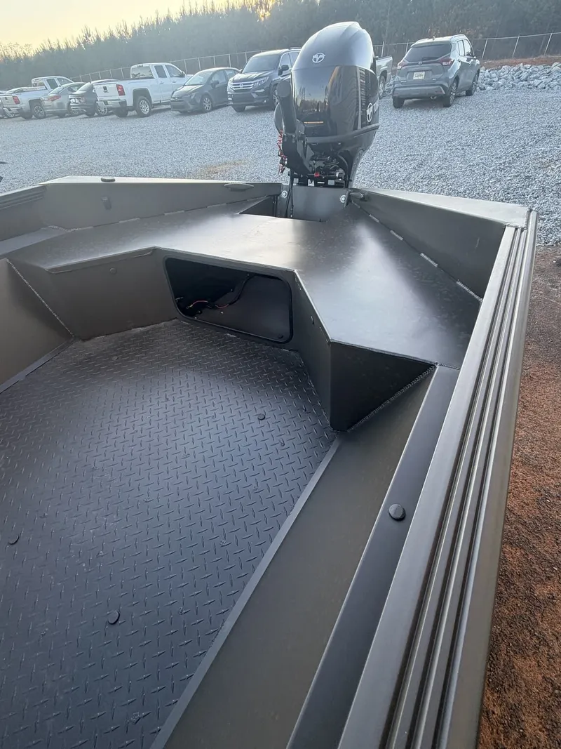 Slide: The Image of Edge Duck Boats Sportsman Series 656, 2026, with outboard motor. - 10