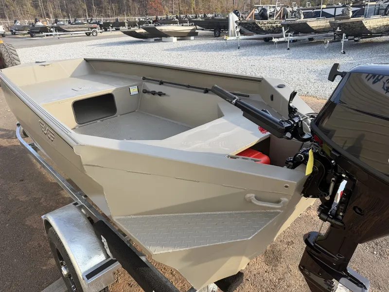 Slide: The Image of 2026 Edge Duck Boats Sportsman Series 553DB MID DECK on trailer, featuring outboard motor. - 4