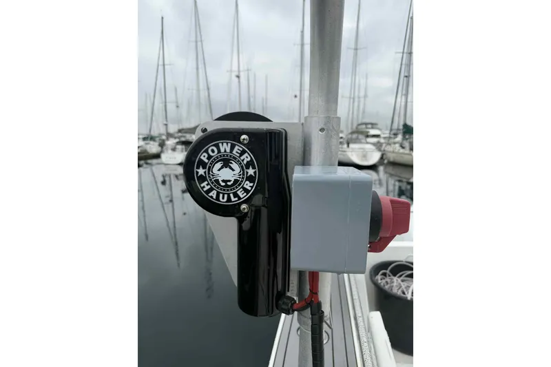 Slide: The Image of Power hauler equipment on Bracewell Commander 36SF, 2025 model, docked at marina. - 25