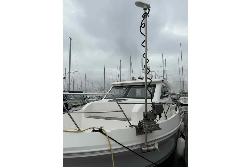 Slide: The Image of 2025 Bracewell Commander 36SF boat docked, featuring advanced equipment and sleek design. - 26