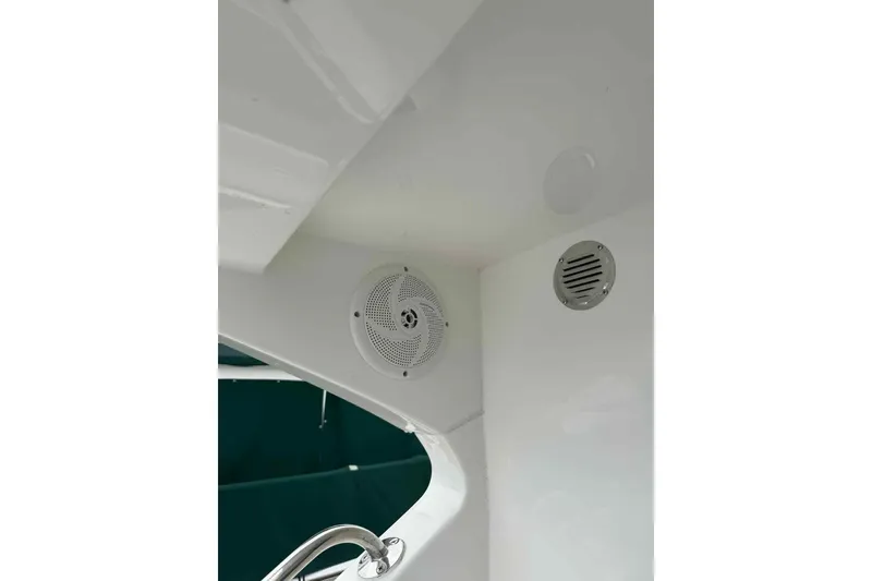 Slide: The Image of Interior view of 2025 Bracewell Commander 36SF boat with speaker and vent. - 28