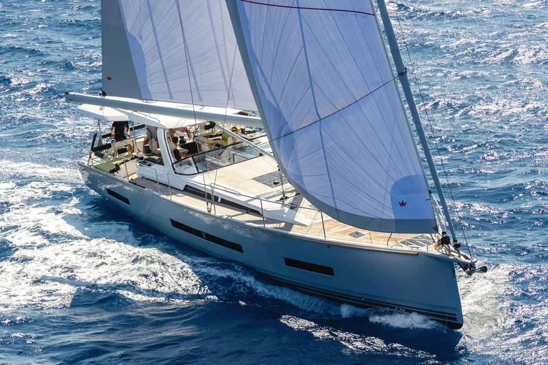 Slide: The Image of Sailing yacht Hanse 590, 2026 model, cruising on open blue sea. - 30