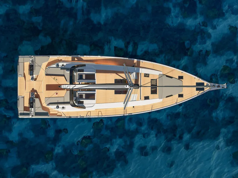 Slide: The Image of Aerial view of 2025 Hanse 590 yacht on clear blue water. - 42