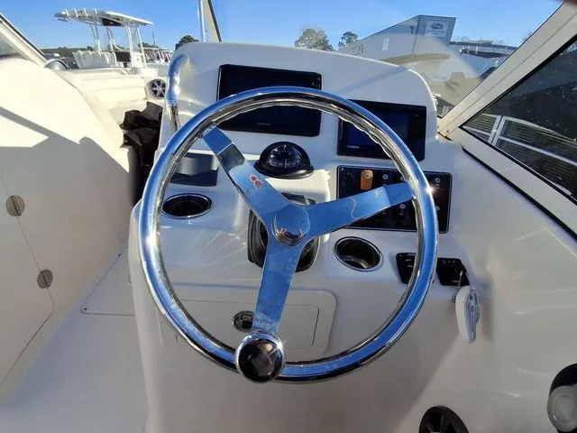 Slide: The Image of Grady-White Freedom 215 2021 - 11