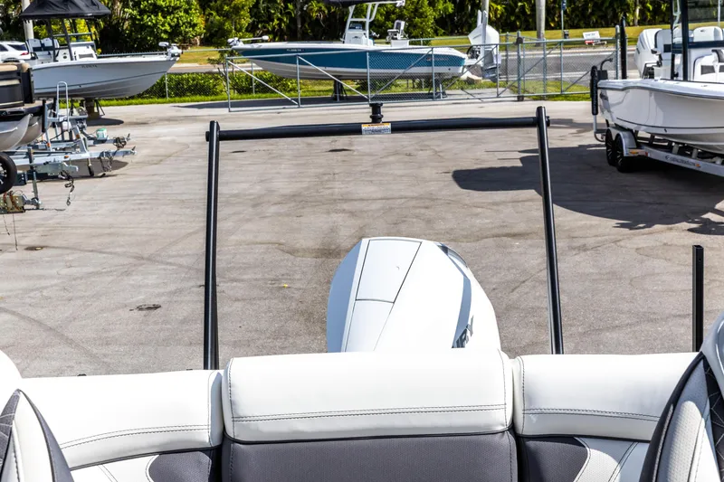 Slide: The Image of 2026 Viaggio Diamante Q boat at marina, surrounded by other boats. - 13