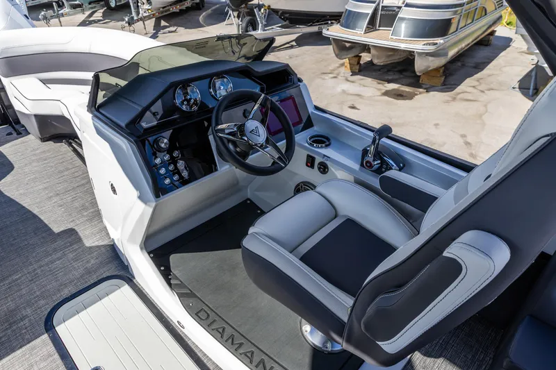 Slide: The Image of Interior of 2026 Viaggio Diamante Q boat with modern dashboard and steering wheel. - 4