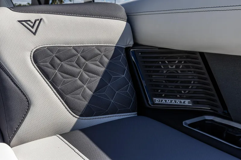 Slide: The Image of Luxurious Viaggio Diamante Q 2026 interior with geometric stitching and branded speaker detail. - 6