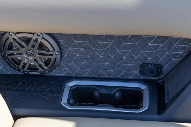 Slide: The Image of Interior of 2026 Viaggio Lago Z-S featuring speaker and cup holder. - 13