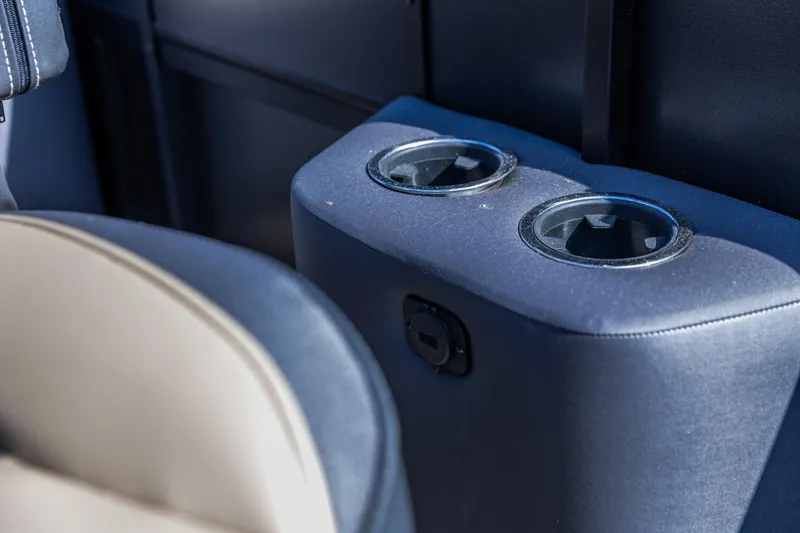 Slide: The Image of 2026 Viaggio Lago Z-S interior cup holders and power outlet detail. - 15