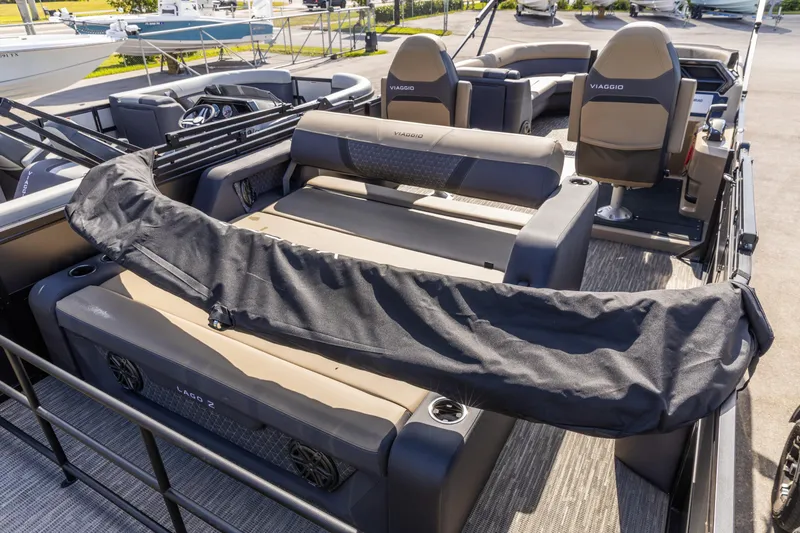 Slide: The Image of 2026 Viaggio Lago Z-S boat interior with seating and covered equipment. - 7