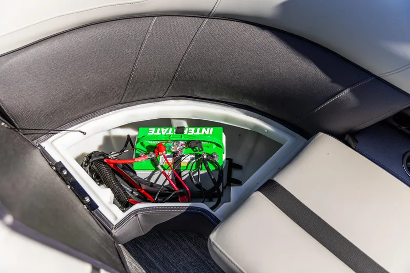 Slide: The Image of Storage compartment in 2026 Viaggio Lago X-U boat with battery and cables. - 19