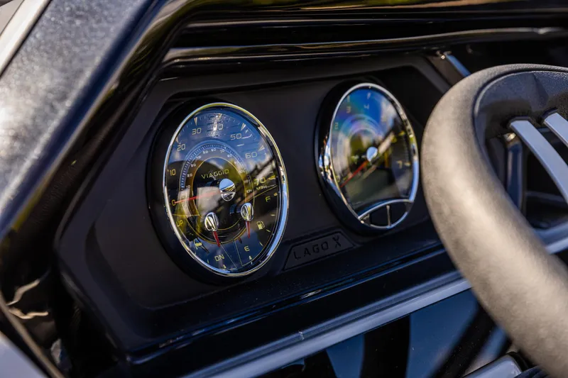 Slide: The Image of 2026 Viaggio Lago X-U dashboard with classic analog gauges and steering wheel. - 21