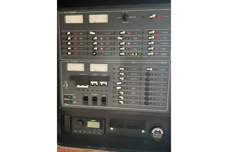 Slide: The Image of Electrical control panel of a 1995 Tiara Yachts 3100 Open boat. - 19