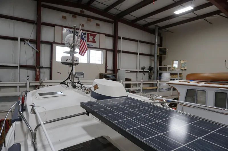 Slide: The Image of 2013 Ranger Tugs S-31 with solar panel in a boat workshop. - 59