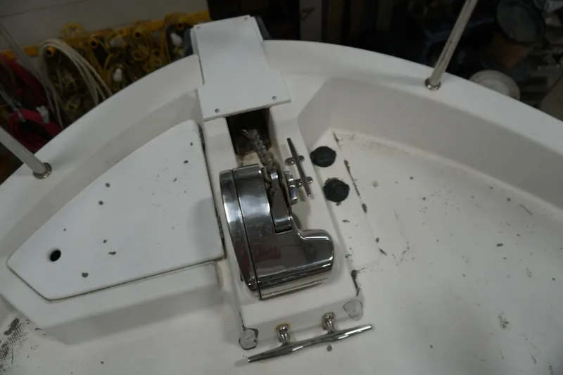 Slide: The Image of 2013 Ranger Tugs S-31 boat deck with anchor winch and cleat. - 60