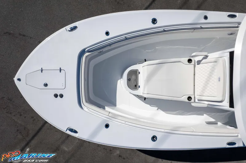 Slide: The Image of 2026 Sea Hunt Ultra 285 SE boat, aerial view of bow seating and deck layout. - 13