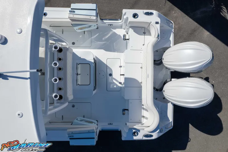 Slide: The Image of Top view of 2026 Sea Hunt Ultra 285 SE boat with dual engines. - 14