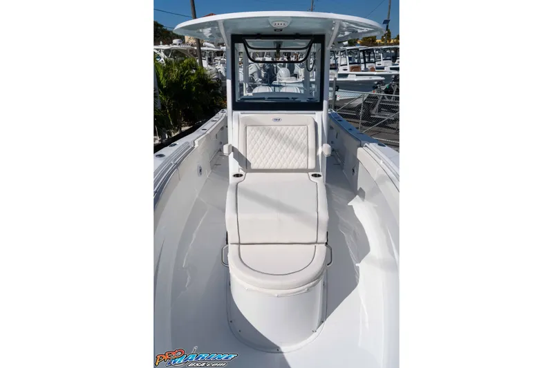 Slide: The Image of 2026 Sea Hunt Ultra 285 SE boat interior with cushioned seating and sleek design. - 17