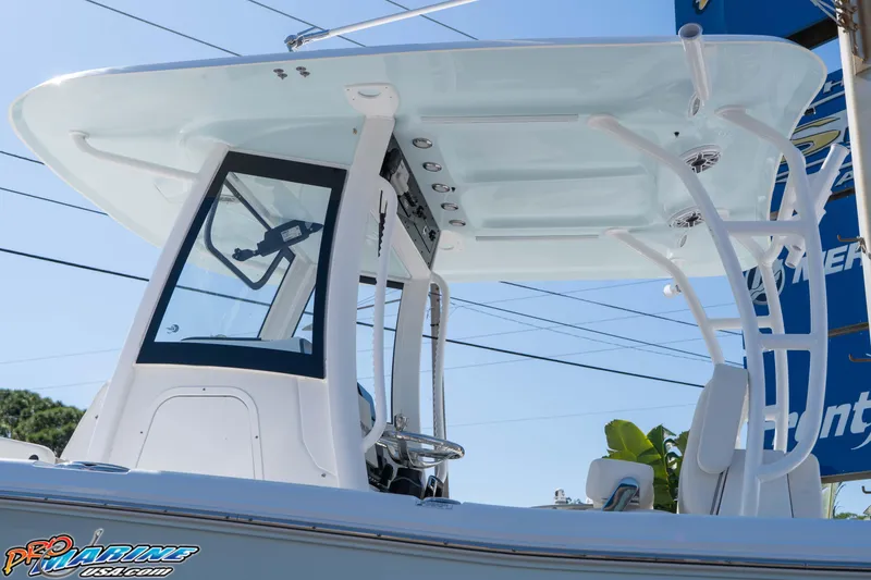 Slide: The Image of 2026 Sea Hunt Ultra 285 SE boat with sleek T-top design and modern features. - 19