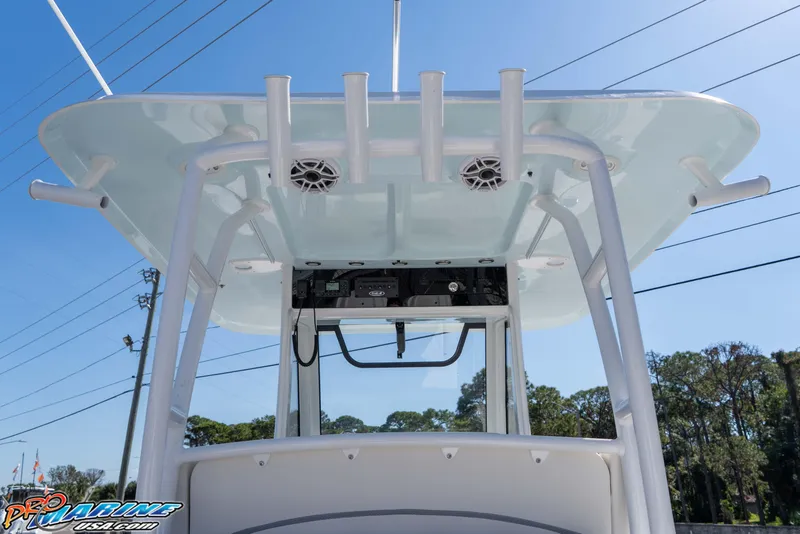 Slide: The Image of 2026 Sea Hunt Ultra 285 SE boat console with speakers and rod holders. - 23