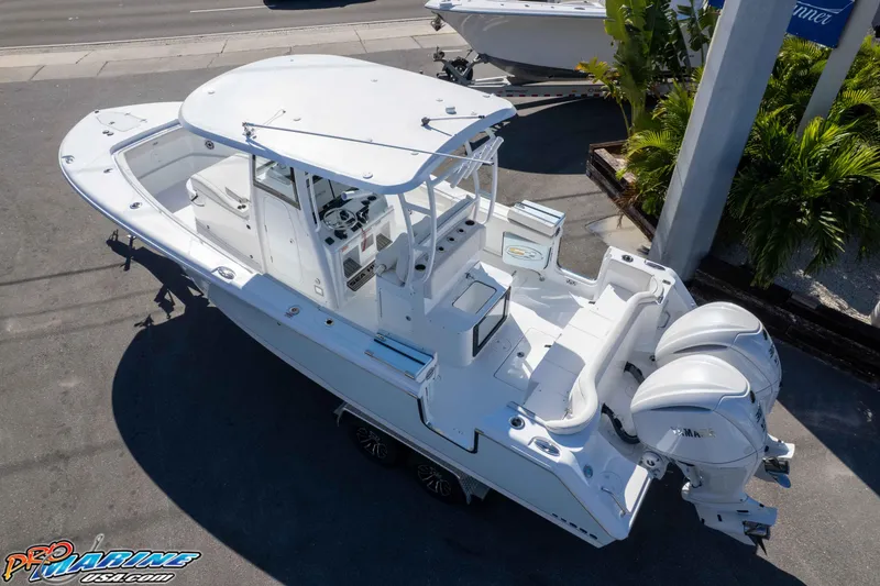 Slide: The Image of 2026 Sea Hunt Ultra 285 SE boat with dual engines, viewed from above. - 7