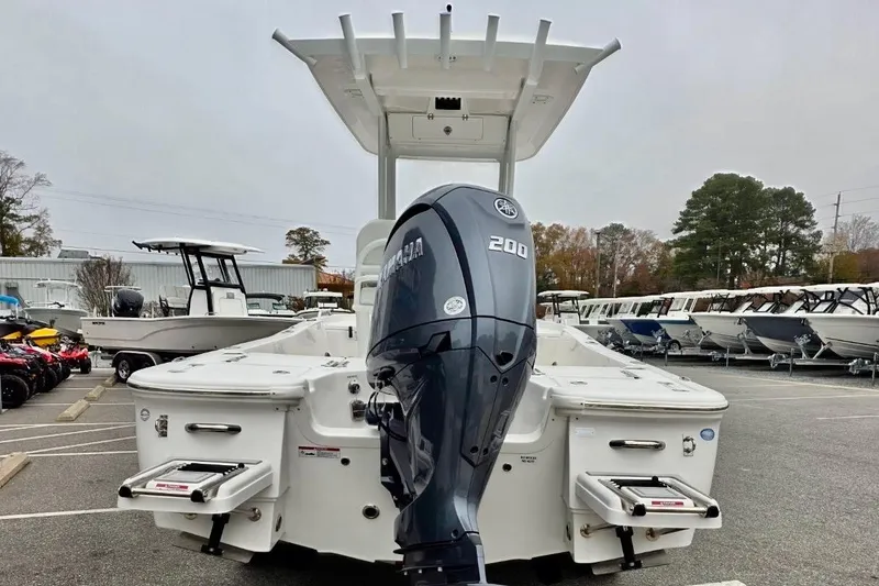 Slide: The Image of 2026 Sea Fox 231 Bay Fox boat with Yamaha 200 engine in a dealership lot. - 16
