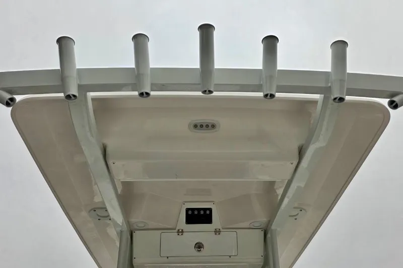 Slide: The Image of 2026 Sea Fox 231 Bay Fox T-top with rod holders, viewed from below. - 3