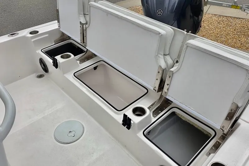 Slide: The Image of 2026 Sea Fox 231 Bay Fox boat interior with open storage compartments. - 5