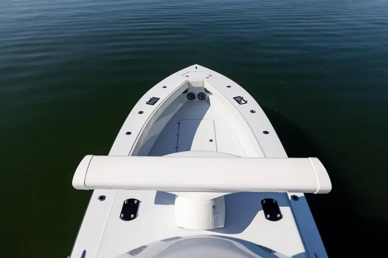 Slide: The Image of Bow view of 2025 Conch 33 boat on calm water. - 61