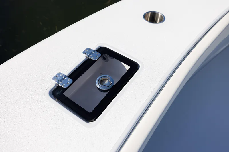 Slide: The Image of Hatch detail on 2025 Conch 33 boat deck with stainless steel hinges. - 80