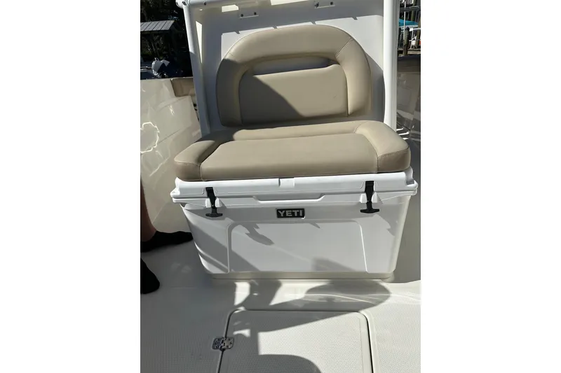 Slide: The Image of 2018 Sailfish 270 CC boat seat with integrated Yeti cooler. - 27