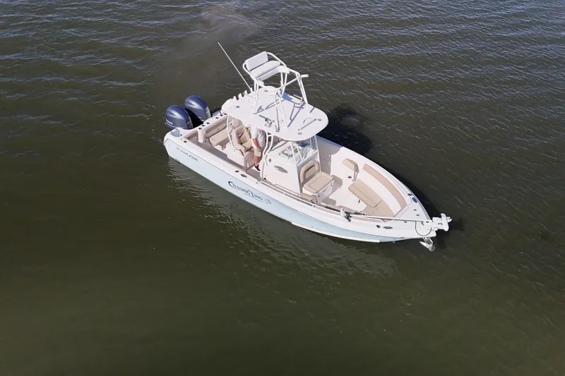 Slide: The Image of 2018 Sailfish 270 CC boat on calm water, aerial view. - 7