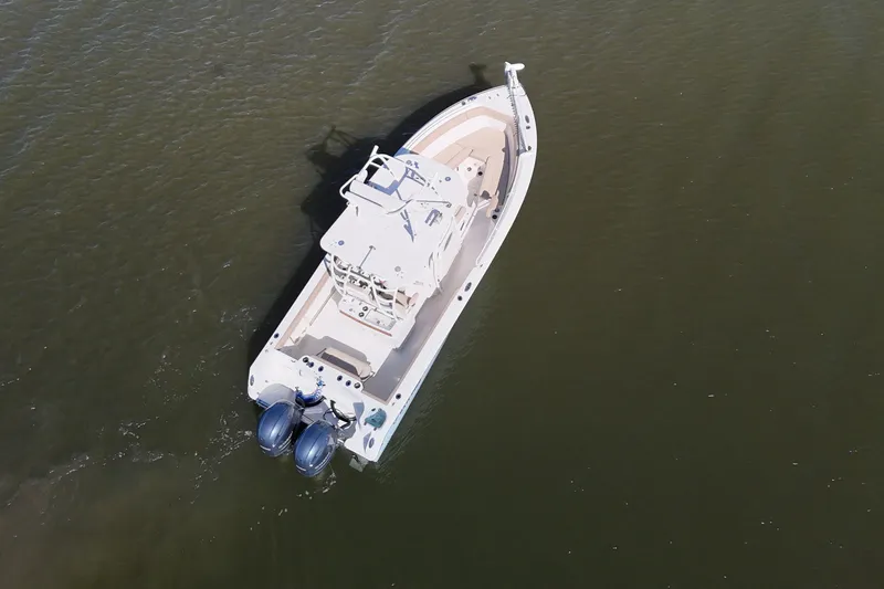 Slide: The Image of Aerial view of 2018 Sailfish 270 CC boat on calm water. - 9