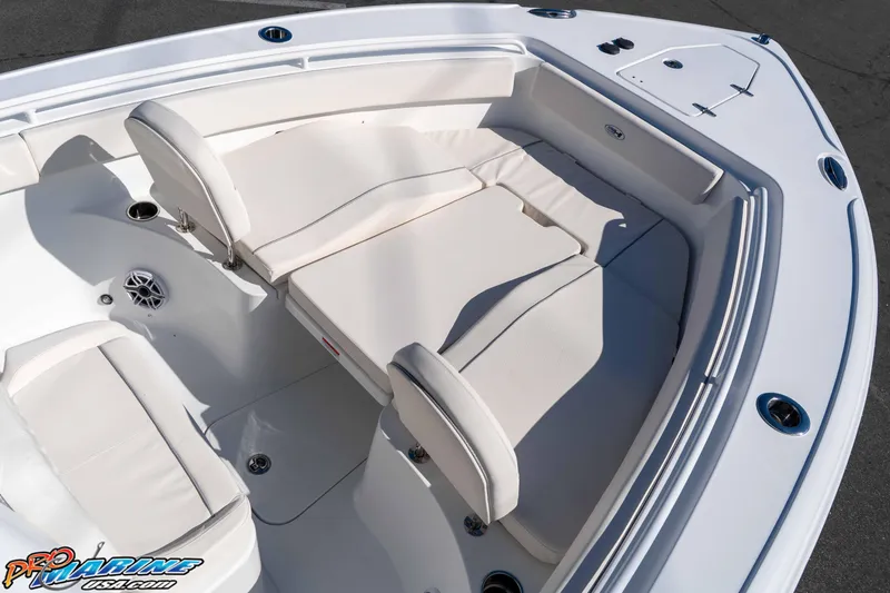 Slide: The Image of 2026 Sea Hunt Ultra 265 SE boat interior with cushioned seating and sleek design. - 33