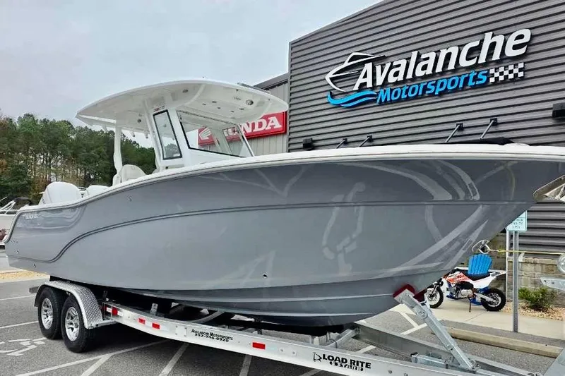The Image of 2026 Sea Fox 288 Commander boat on trailer at Avalanche Motorsports dealership. - 1