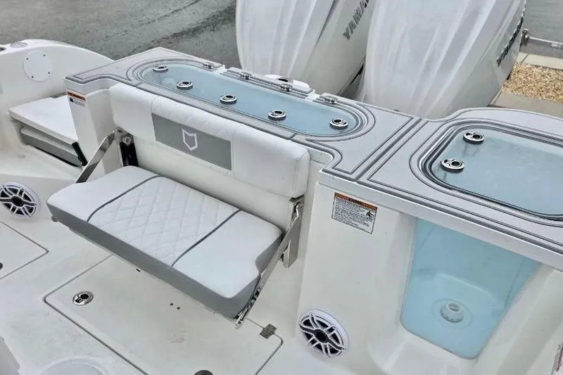 Slide: The Image of 2026 Sea Fox 288 Commander boat interior with seating and storage compartments. - 10