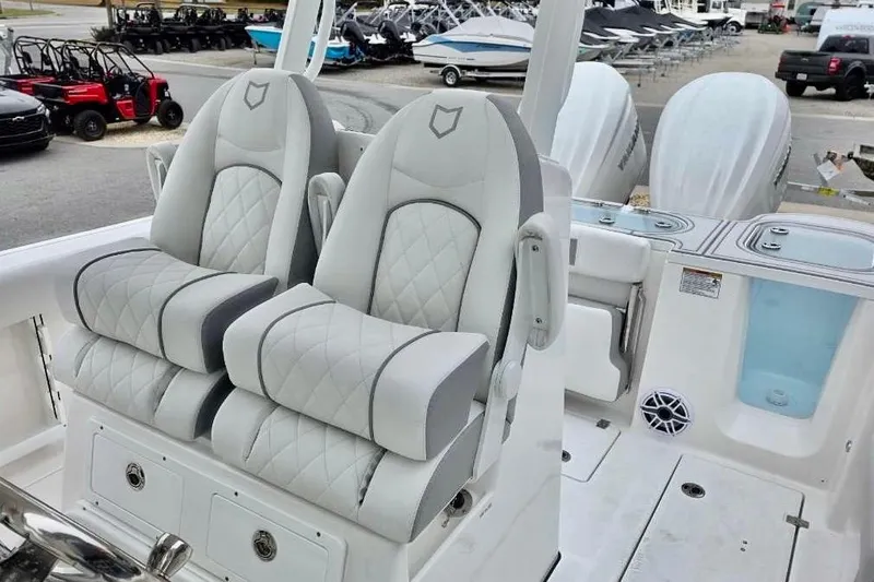 Slide: The Image of Luxury seating on 2026 Sea Fox 288 Commander boat, featuring premium upholstery and modern design. - 14