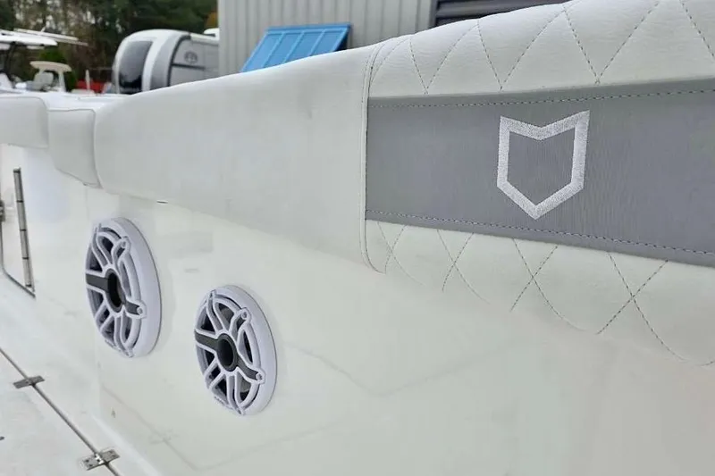 Slide: The Image of 2026 Sea Fox 288 Commander boat interior with speakers and quilted upholstery. - 15