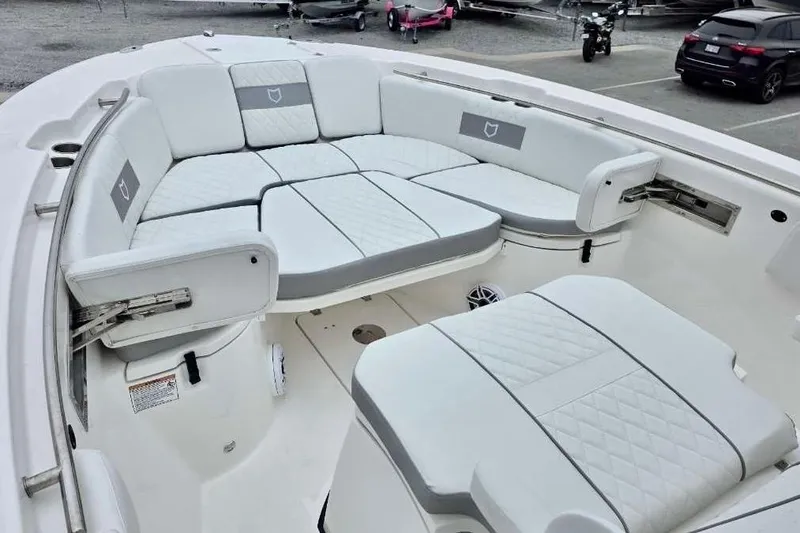 Slide: The Image of 2026 Sea Fox 288 Commander boat with spacious white seating area. - 19
