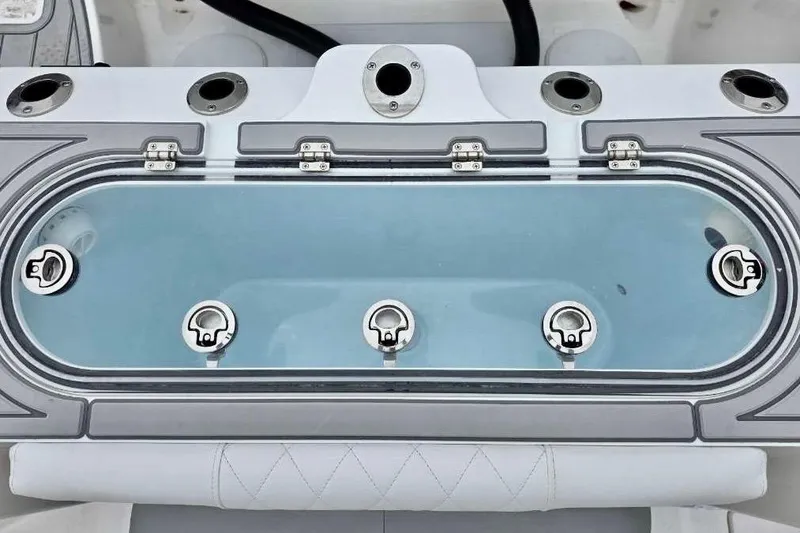 Slide: The Image of Livewell on 2026 Sea Fox 288 Commander boat, featuring multiple rod holders. - 9