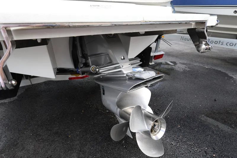 Slide: The Image of 2022 Cobalt 220S boat stern with propeller and outdrive detail. - 7