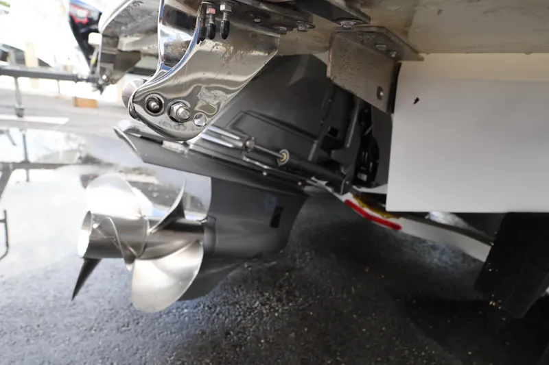 Slide: The Image of Close-up of 2022 Cobalt 220S boat propeller and stern drive. - 8