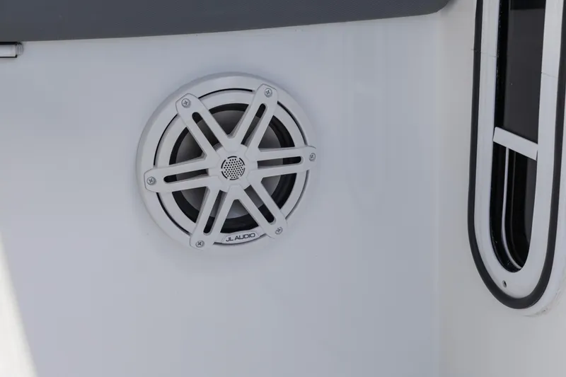 Slide: The Image of JL Audio speaker on 2020 Cobalt 30SC Outboard boat interior. - 20