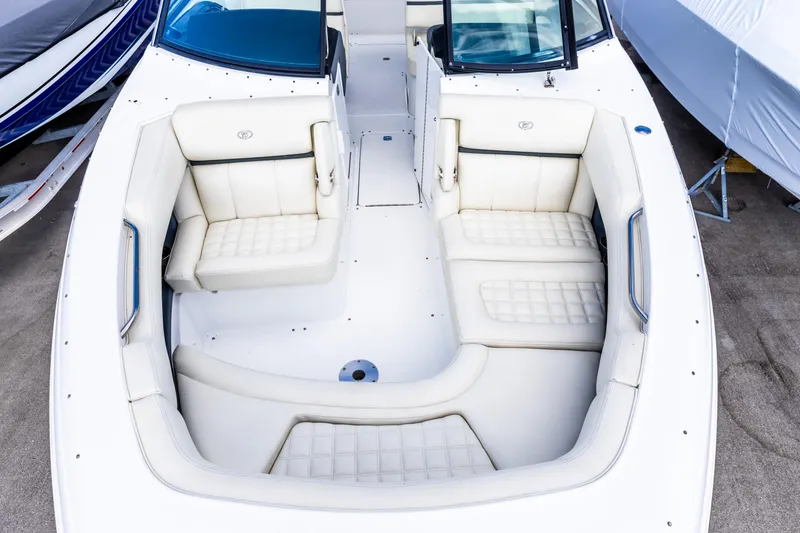 Slide: The Image of 2020 Cobalt 30SC Outboard boat with spacious white seating area. - 3