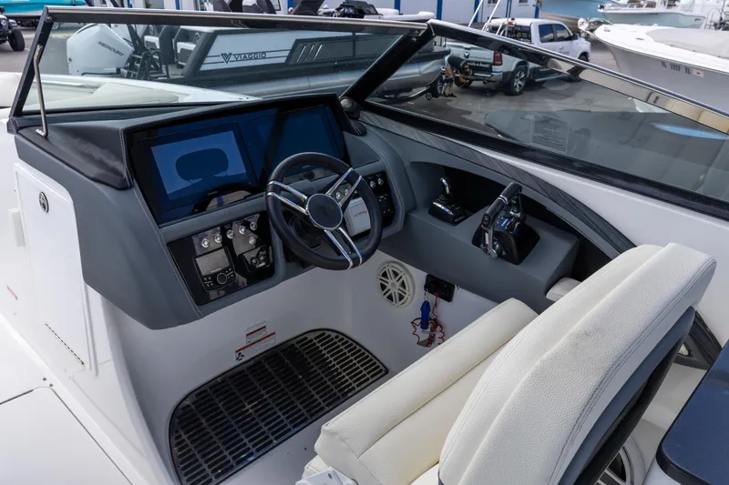 Slide: The Image of 2020 Cobalt 30SC Outboard boat interior with sink and toilet. - 4